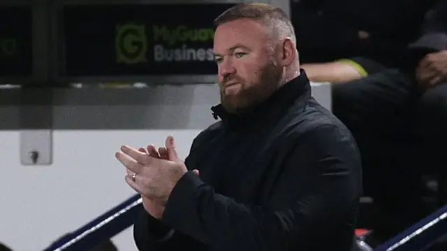 Wayne Rooney on the touchline