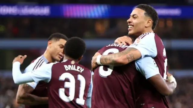 Morgan Rogers celebrates with his Aston Villa team-mates