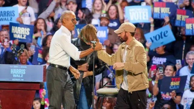 Rapper Eminem introduces former president Barack Obama during a rally to supporters of Vice President Kamala Harris 2024 presidential run in Detroit, MI,