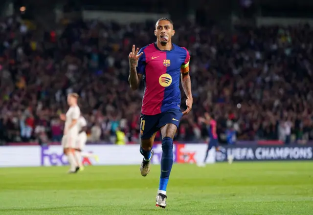 Raphinha of FC Barcelona celebrates scoring his team's fourth goal and his hat-trick