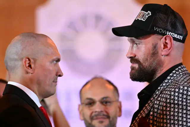 Oleksandr Usyk and Tyson Fury face off