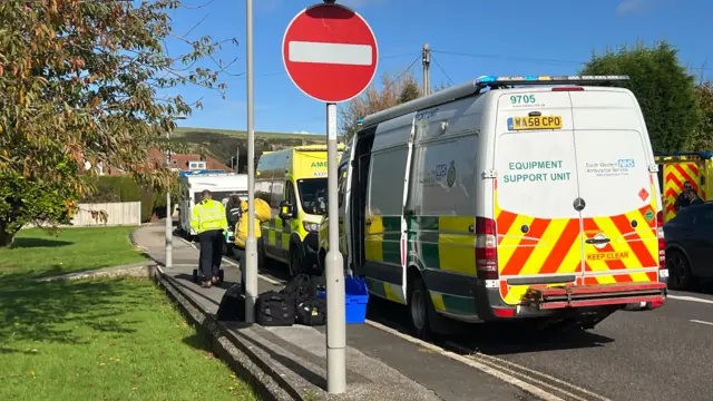 Emergency services lining the streets approaching Ulwell Road