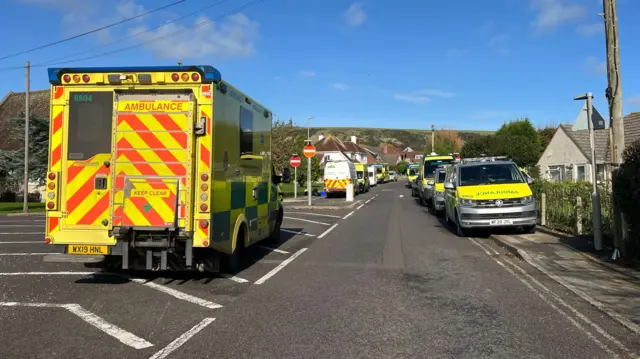 Emergency services lining the streets approaching Ulwell Road