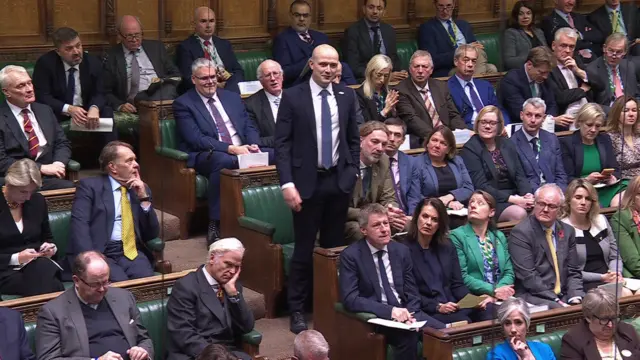 Flynn standing in the Commons during PMQs