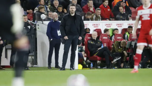 Michael Carrick on the touchline