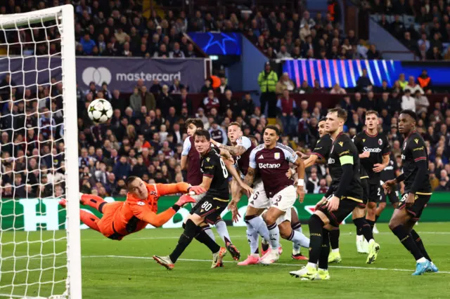 John McGinn's free-kick sneaks in