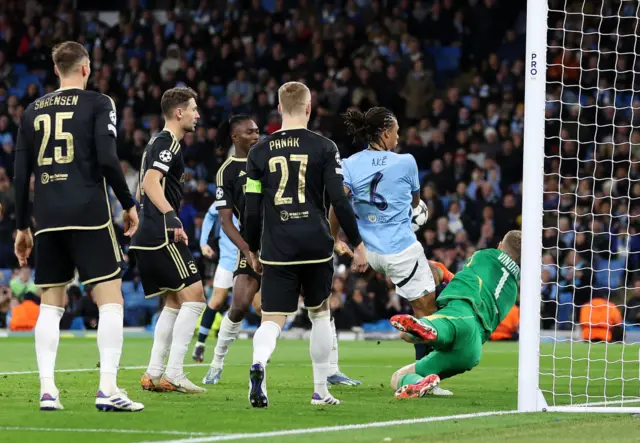 Nathan Ake of Manchester City scores a goal which is later disallowed for handball