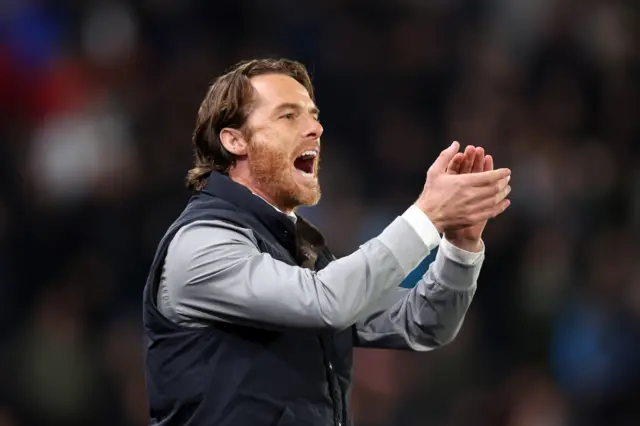 Burnley boss Scott Parker claps