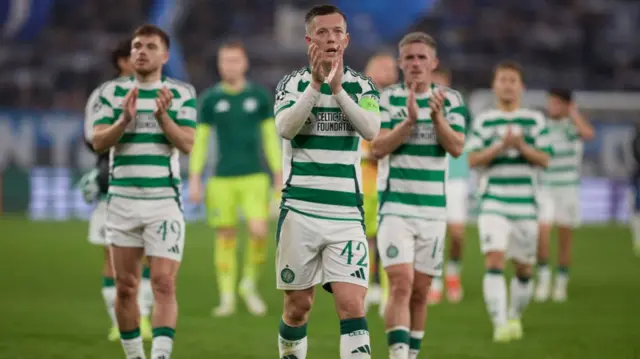 Celtic players applaud their supporters following their 0-0 draw against Atalanta.