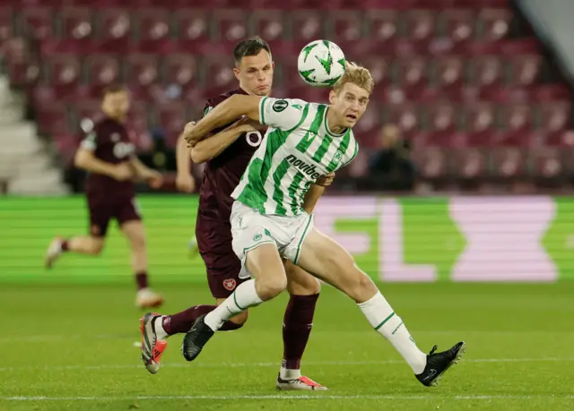 Hearts players battle for the ball