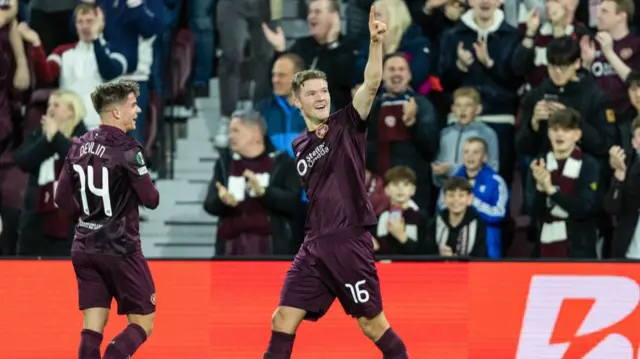 EDINBURGH , SCOTLAND - OCTOBER 24: Hearts' Blair Spittal celebrates scoring to make it 2-0 during a UEFA Conference League 2024/25 League Phase MD2 between Hearts and Omonia Nicosia at Tynecastle Park, on October 24, 2024, in Edinburgh, Scotland.  (Photo by Ross Parker / SNS Group)