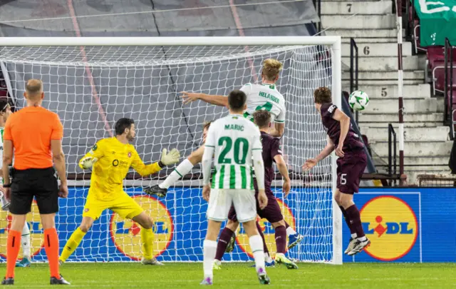 EDINBURGH , SCOTLAND - OCTOBER 24: Omonia's Filip Helander has a headed shot during a UEFA Conference League 2024/25 League Phase MD2 between Hearts and Omonia Nicosia at Tynecastle Park, on October 24, 2024, in Edinburgh, Scotland.  (Photo by Ross Parker / SNS Group)