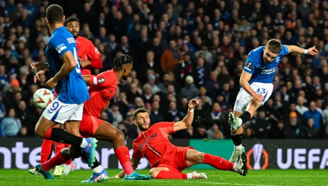 GLASGOW, SCOTLAND - OCTOBER 24: Rangers' Nicolas Raksin (R) has a shot at goal during a UEFA Europa League 2024/25 League Phase MD3 match between Rangers and FCSB at Ibrox Stadium, on October 24, 2024, in Glasgow, Scotland. (Photo by Rob Casey / SNS Group)