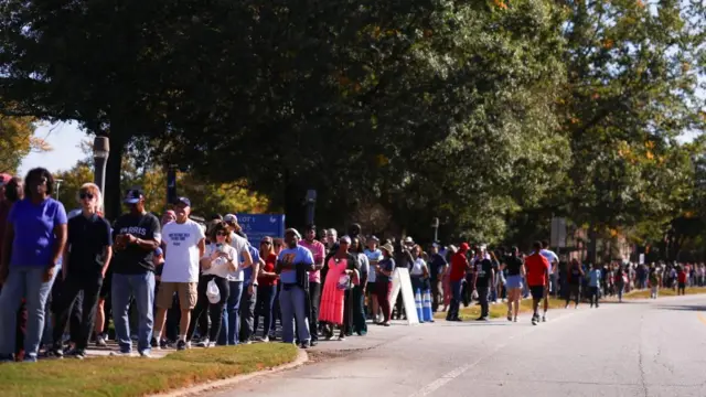 Hundreds of people line the streets awaiting to get into a rally for Kamala Harris in Georgia