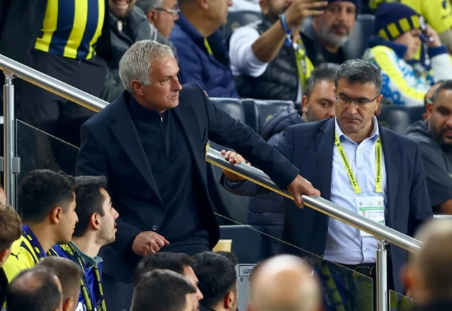 Fenerbahce head coach Jose Mourinho finds a place in the stands