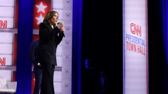 Kamala Harris speaks as she replies to a question from an attendee during a CNN Town Hall moderated by television host Anderson Cooper at Sun Center studios in Aston, Pennsylvani