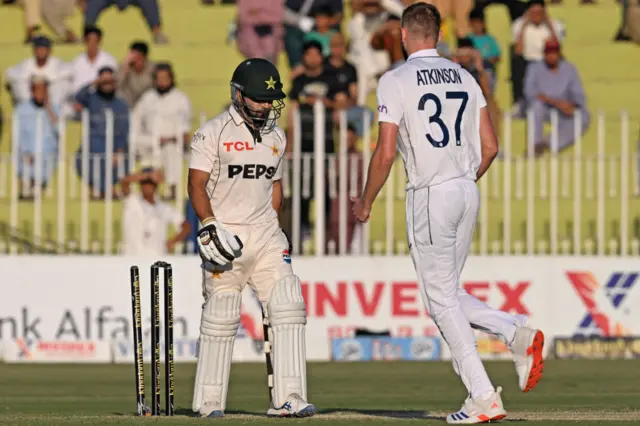 Gus Atkinson bowls Kamran Ghulam