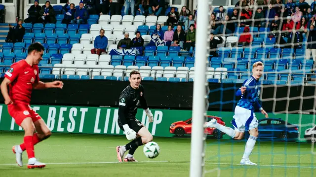 Larne's Shaun Want gets back to deny Molde a goal