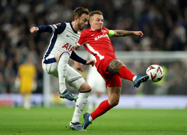 ordy Clasie of AZ Alkmaar controls the ball whilst under pressure from James Maddison of Tottenham Hotspur