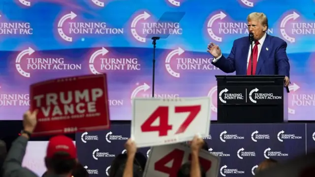 Republican presidential nominee and former U.S. President Donald Trump speaks during a campaign event sponsored by conservative group Turning Point USA