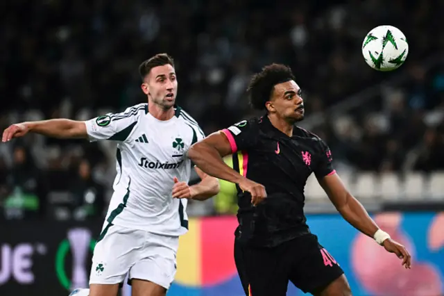 Renato Veiga (R) fights for the ball with Panathinaikos' Andraz Sporar