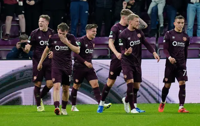 Heart of Midlothian's Blair Spittal celebrates with teammates after scoring