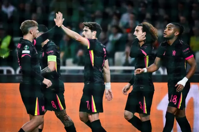 Chelsea's players celebrate after scoring during the UEFA Conference League