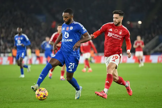 Ricardo Pereira of Leicester City controls the ball under pressure from Alex Moreno