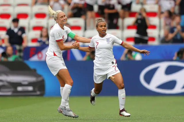 Parris and Houghton celebrate a goal at the Women's World Cup 2015