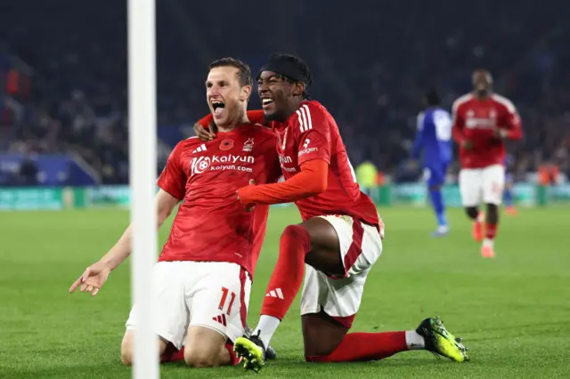 Chris Wood (L) celebrates