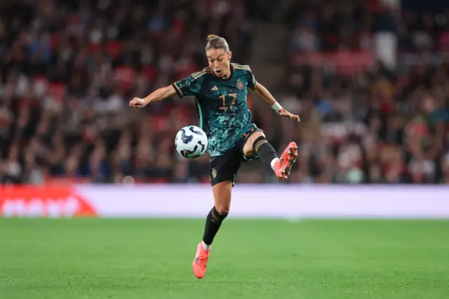 Felicitas Rauch controlling the ball