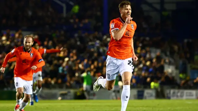 Michael Smith celebrates