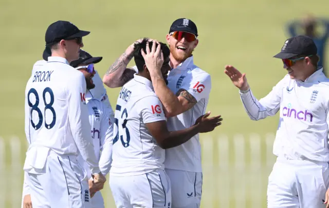 England celebrate Rehan wicket