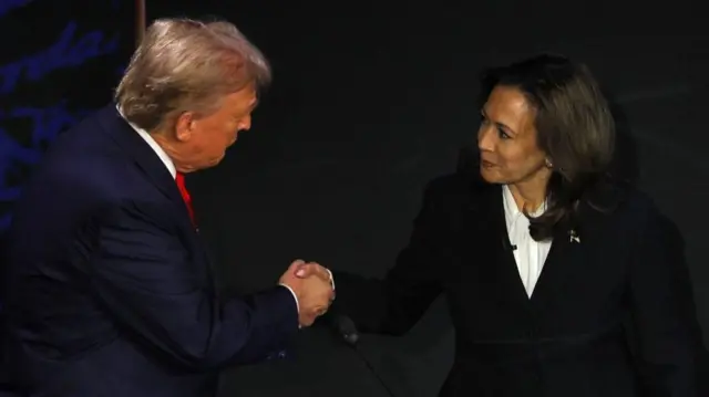 Trump and Harris shake hands before their debate in September