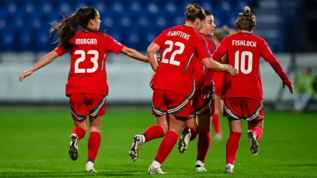 Wales celebrate Ffion Morgan's goal