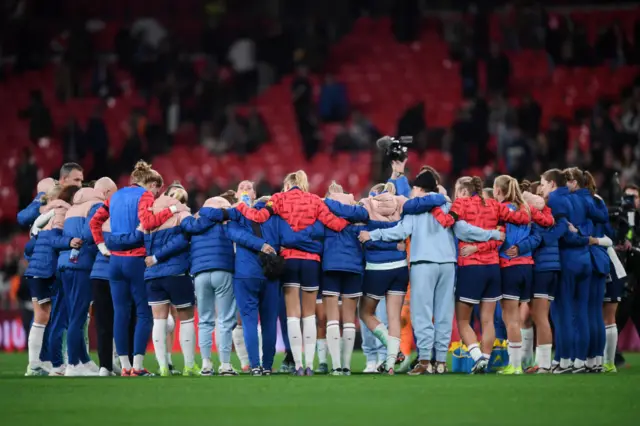 England women team talk after Germany defeat