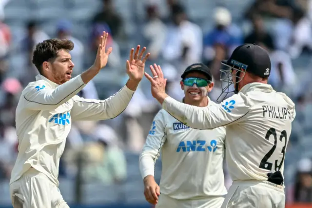 Mitchell Santner celebrates wicket