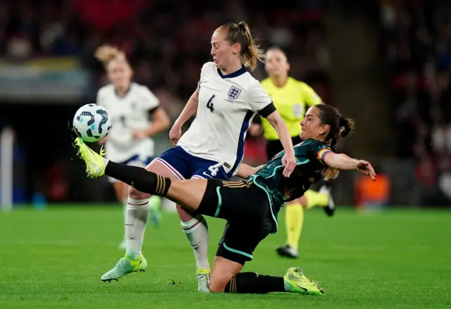 England's Keira Walsh (left) and Germany's Sara Dabritz battle for the ball