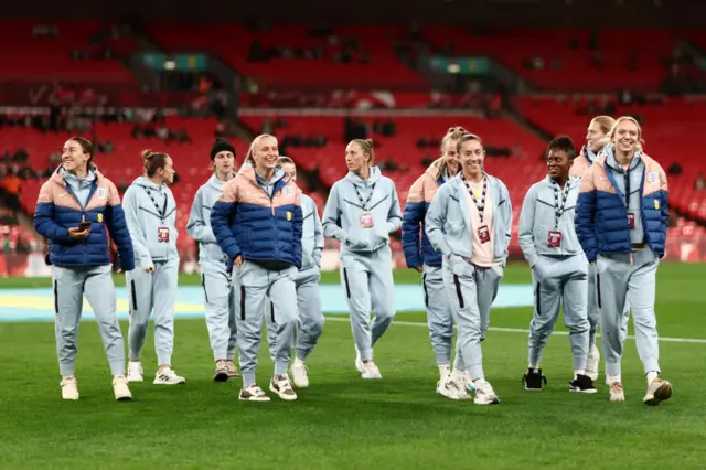 England team walk across the Wembley pitch