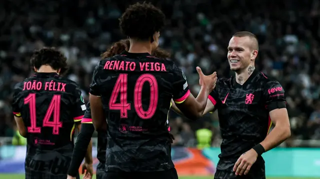 Mykhailo Mudryk is congratulated by Renato Veiga after scoring for Chelsea against Panathinaikos