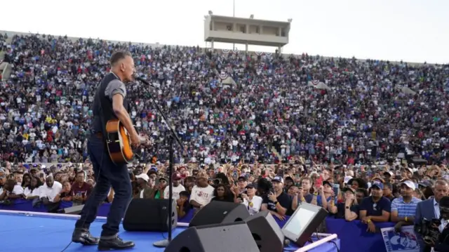 Bruce Springsteen performs during a rally for Democratic presidential nominee U.S. Vice President Kamala Harris in Atlanta, Georgia