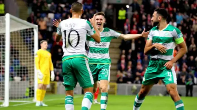 Shamrock Rovers players celebrate a goal against Larne