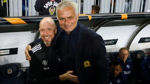 Managers Erik ten Hag and Jose Mourinho hug before Manchester United play Fenerbahce