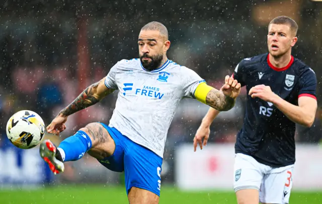 Kilmarnock's Kyle Vassell and Ross County's Ryan Leak