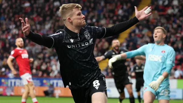 Wrexham's Andy Cannon celebrates scoring against Charlton.