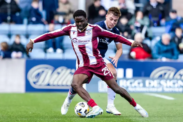 St Johnstone’s Benjamin Kimpioka and Dundee's Ryan Astley