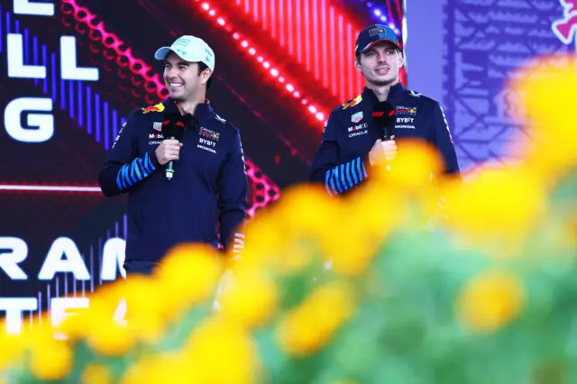 Max Verstappen and Sergio Perez on stage in Mexico