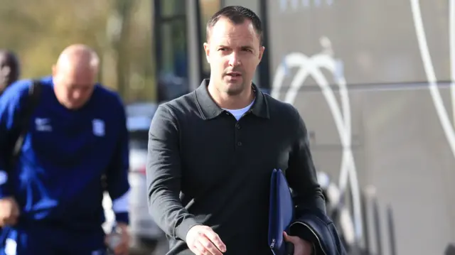 Birmingham City manager Chris Davies arrives at Mansfield's Field Mill