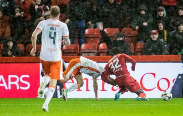 ABERDEEN, SCOTLAND - OCTOBER 26: Aberdeen are awarded a penalty after Peter Ambrose is fouled but is overturned because of offside during a William Hill Premiership match between Aberdeen and Dundee United at Pittodrie Stadium, on October 26, 2024, in Aberdeen, Scotland. (Photo by Alan Harvey / SNS Group)