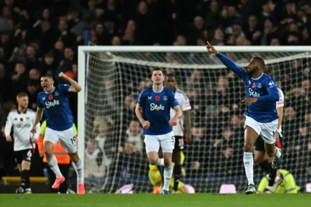 Beto, Keane and Mykolenko celebrate Everton's late equaliser as they run back to kick off